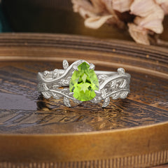 Artistic Vine  Themed 4 - Prong Pear Cut Peridot Stackable Rings