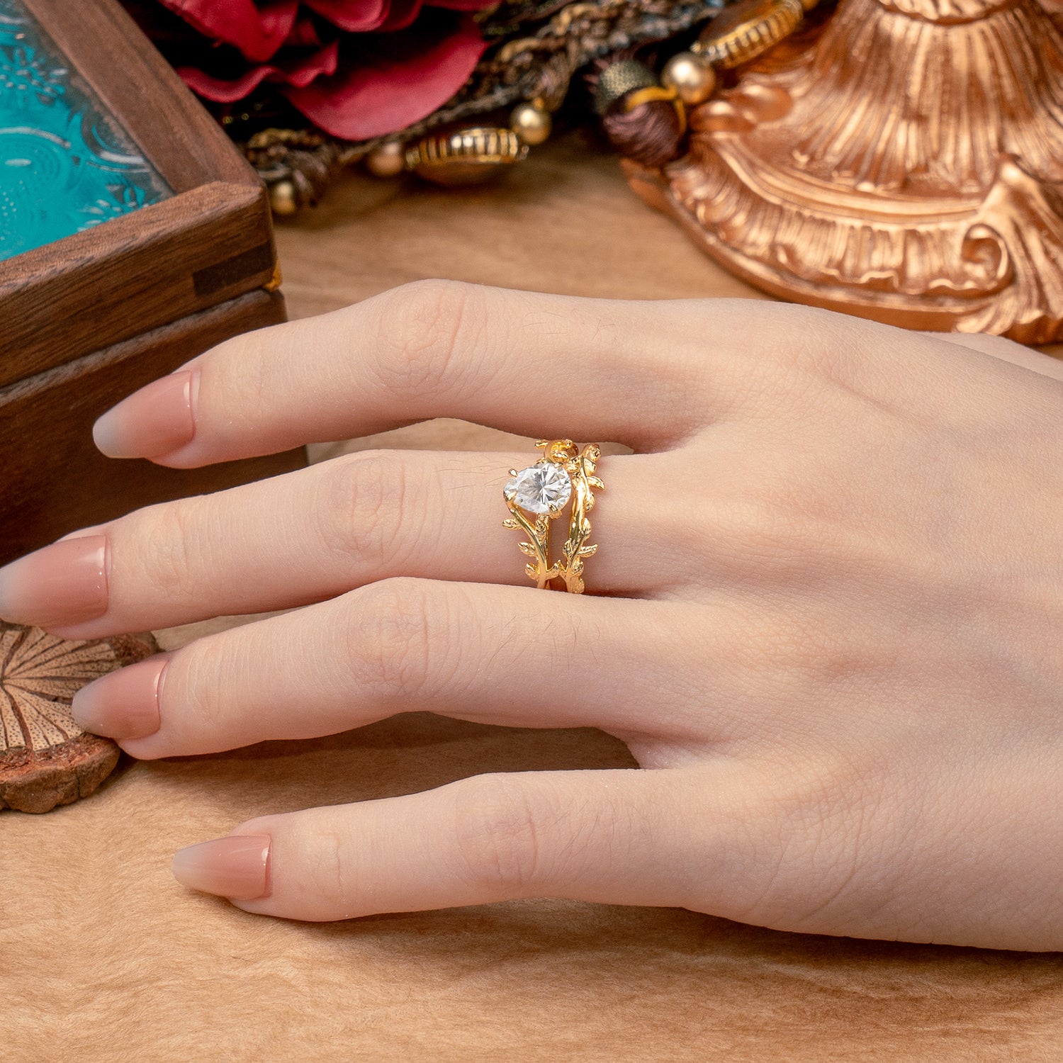 Artistic Vine  Themed 4 - Prong Pear Cut Moissanite Bridal Ring Set