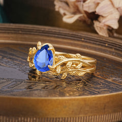 Artistic Vine  Themed 4 - Prong Pear Cut Sapphire Stackable Rings