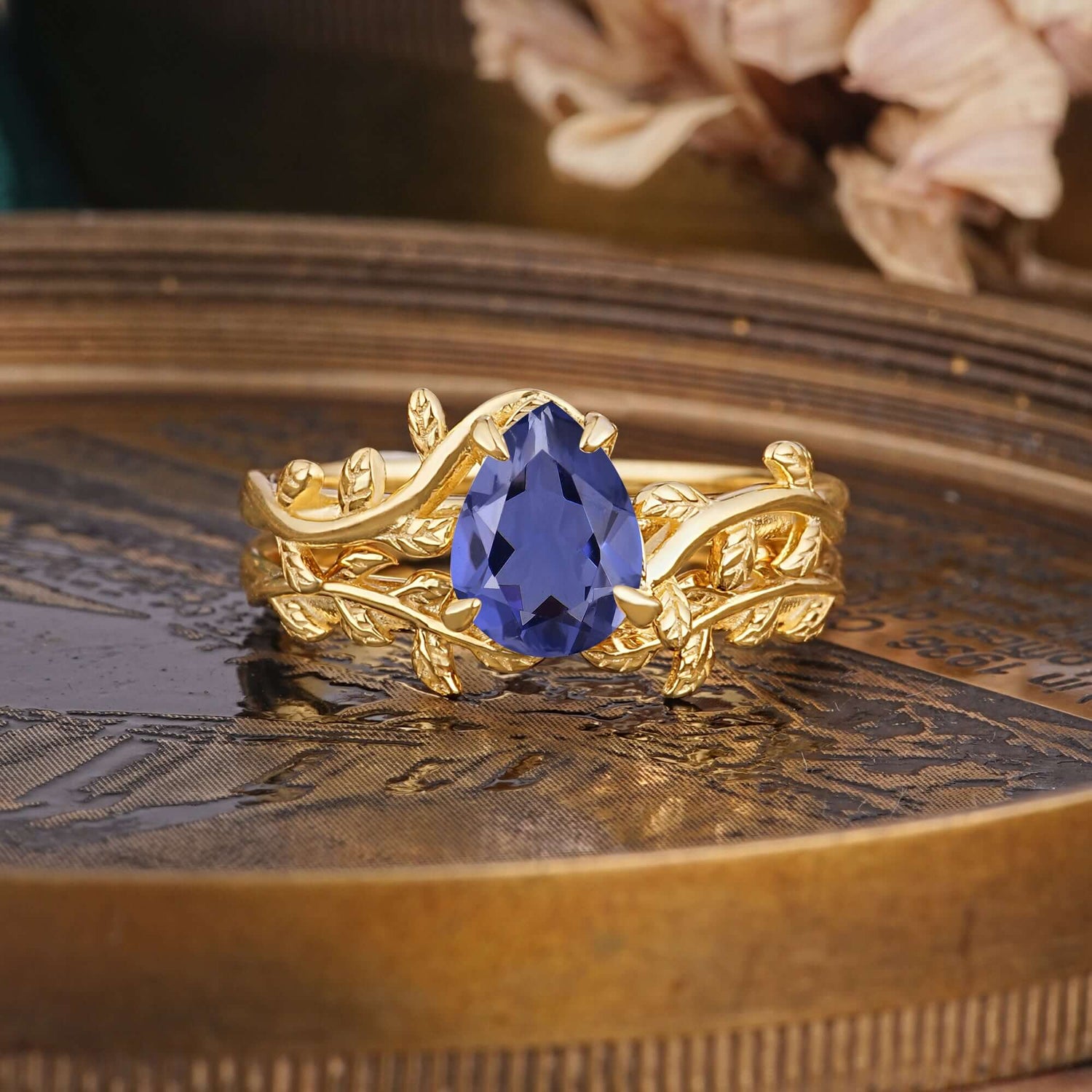 Artistic Vine  Themed 4 - Prong Pear Cut Tanzanite Bridal Ring Set