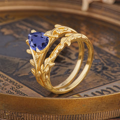 Artistic Vine  Themed 4 - Prong Pear Cut Tanzanite Stackable Rings