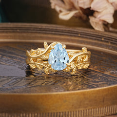 Artistic Vine Themed 4 - Prong Pear Cut Aquamarine Stackable Rings