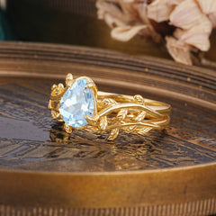 Artistic Vine Themed 4 - Prong Pear Cut Aquamarine Stackable Rings