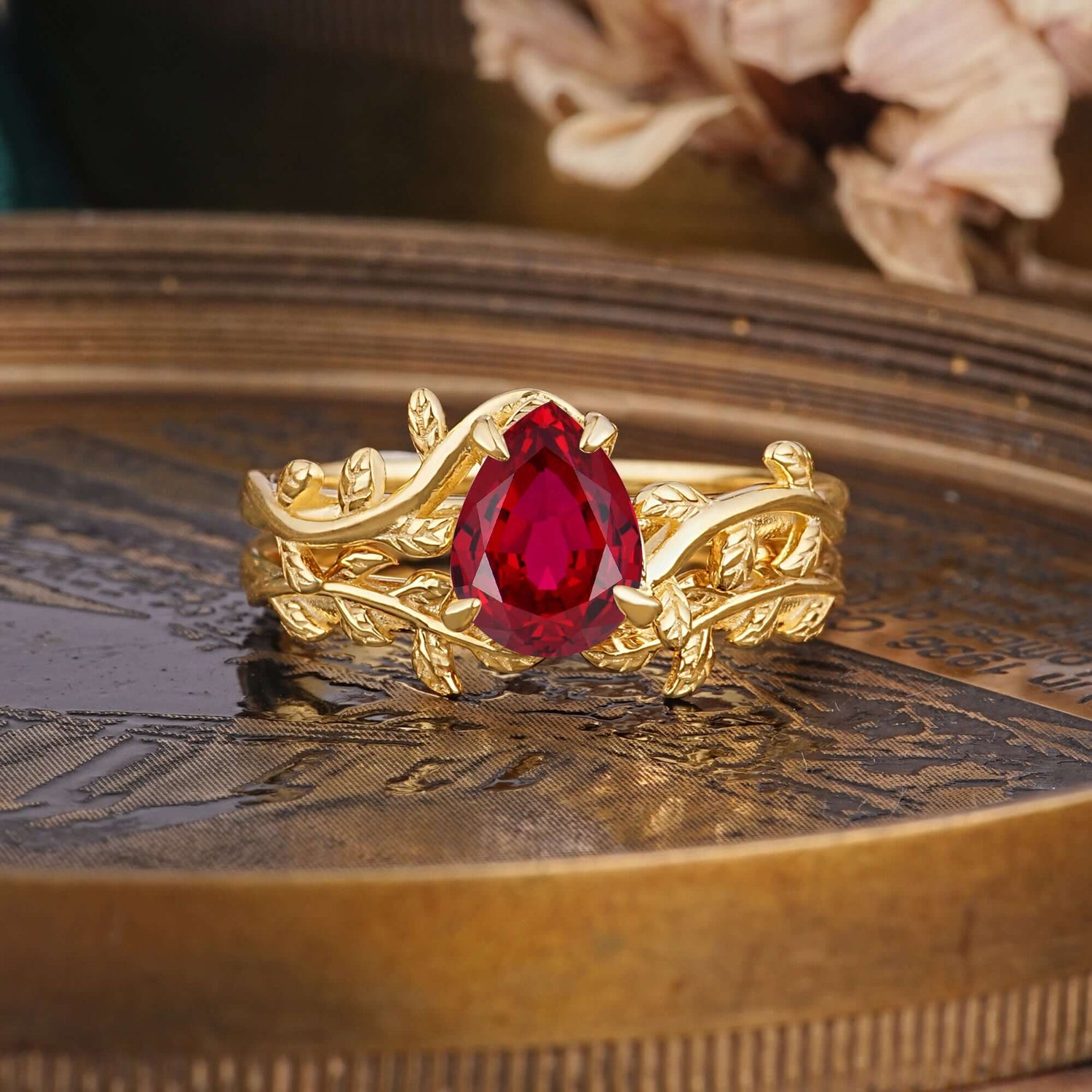 Artistic Vine Themed 4 - Prong Pear Cut Ruby Bridal Ring Set