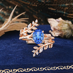 Delicate Leaf Embellished 4 - Prong Oval - Cut Sapphire Ring Sets