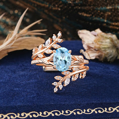 Delicate Leaf Embellished 4 - Prong Oval - Cut Natural Aquamarine Ring Sets