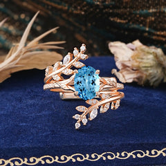 Delicate Leaf Embellished 4 - Prong Oval - Cut Aquamarine Ring Sets