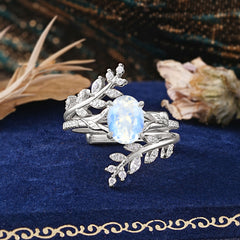 Delicate Leaf Embellished 4 - Prong Oval - Cut Moonstone Ring Sets