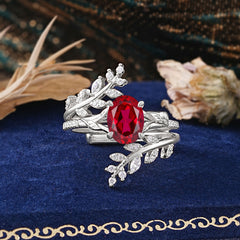 Delicate Leaf Embellished 4 - Prong Oval - Cut Natural Ruby Ring Sets