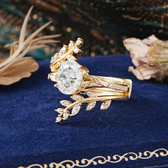 Delicate Leaf Embellished 4 - Prong Oval - Cut Moissanite Ring Sets