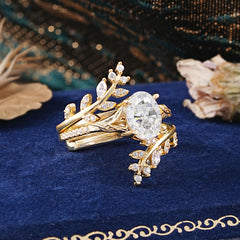 Delicate Leaf Embellished 4 - Prong Oval - Cut Moissanite Ring Sets