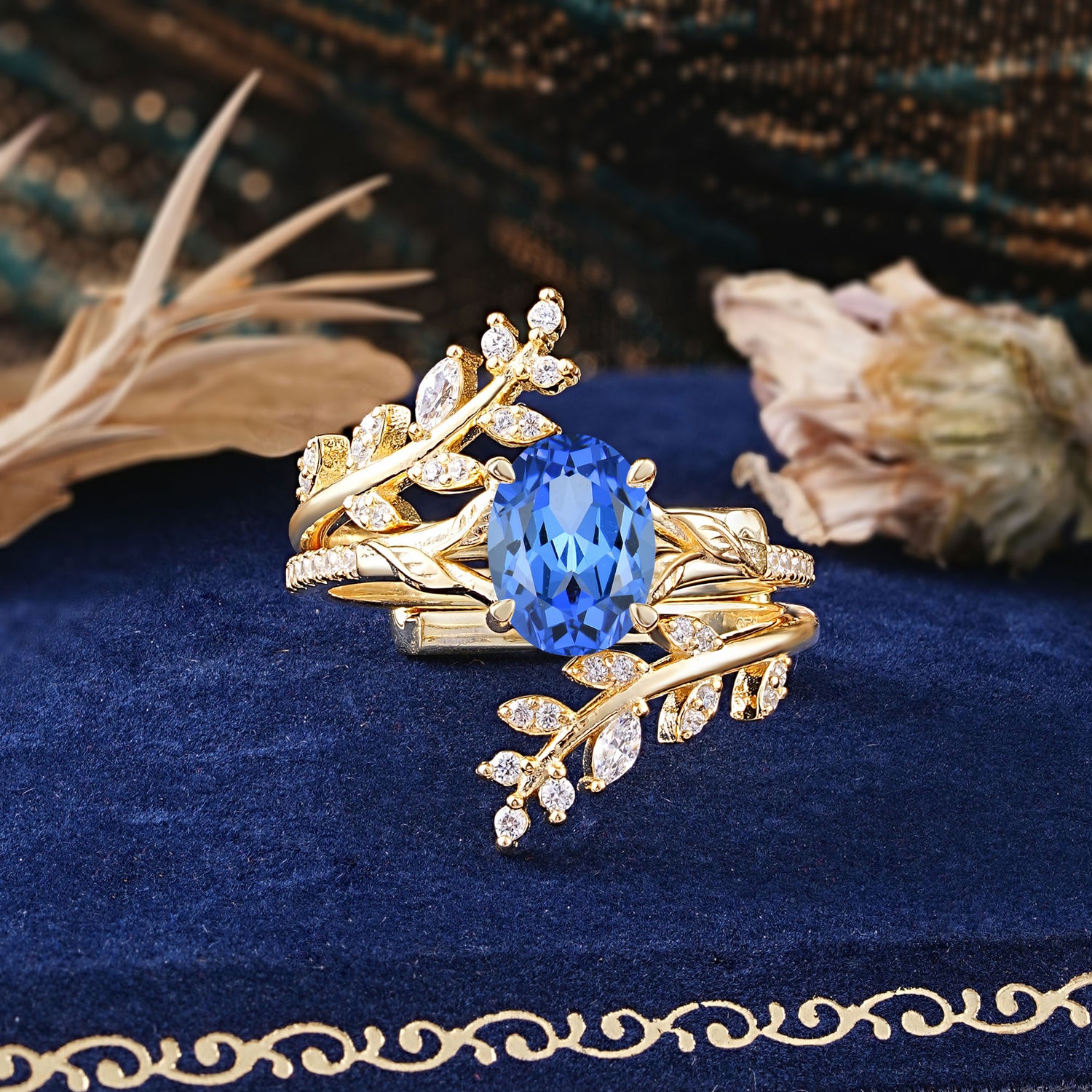 Delicate Leaf Embellished 4 - Prong Oval - Cut Sapphire Bridal Ring Set