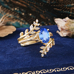 Delicate Leaf Embellished 4 - Prong Oval - Cut Sapphire Ring Sets