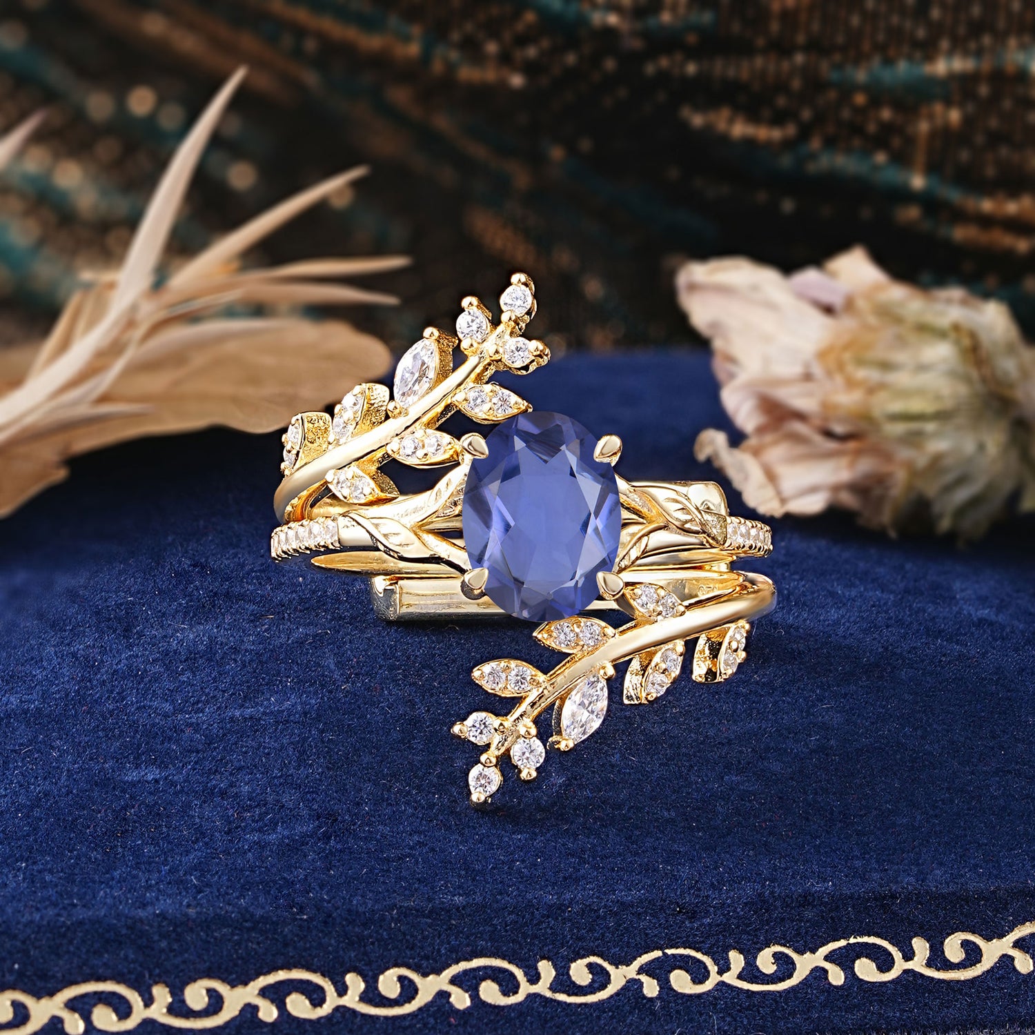Delicate Leaf Embellished 4 - Prong Oval - Cut Tanzanite Bridal Ring Set