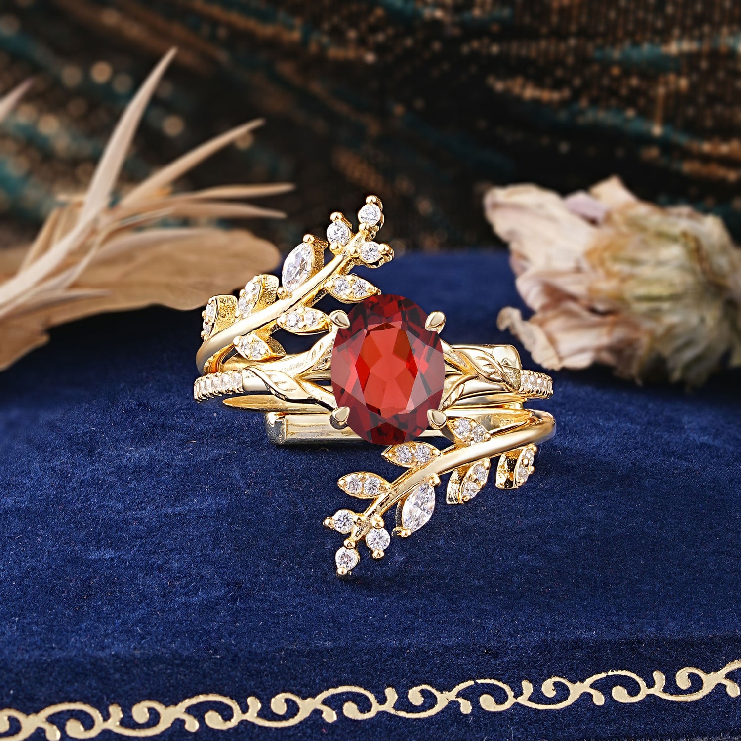 Delicate Leaf Embellished 4 - Prong Oval - Cut Garnet Bridal Ring Set