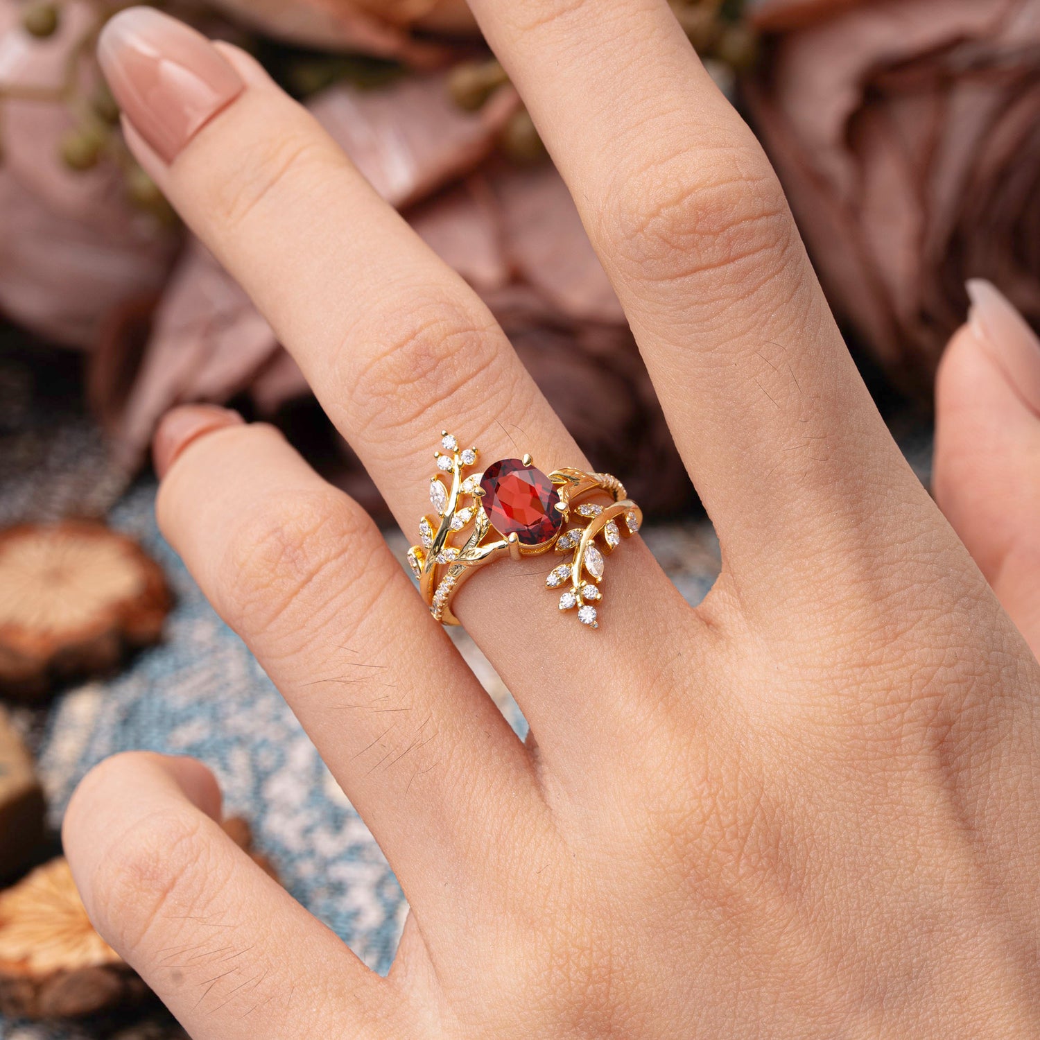 Delicate Leaf Embellished 4 - Prong Oval - Cut Garnet Bridal Ring Set