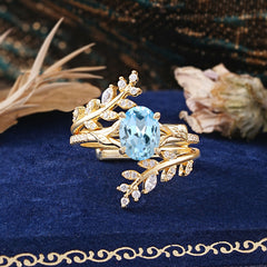 Delicate Leaf Embellished 4 - Prong Oval - Cut Natural Aquamarine Ring Sets