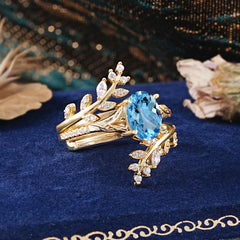 Delicate Leaf Embellished 4 - Prong Oval - Cut Aquamarine Ring Sets
