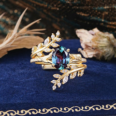 Delicate Leaf Embellished 4 - Prong Oval - Cut Natural Alexandrite Ring Sets
