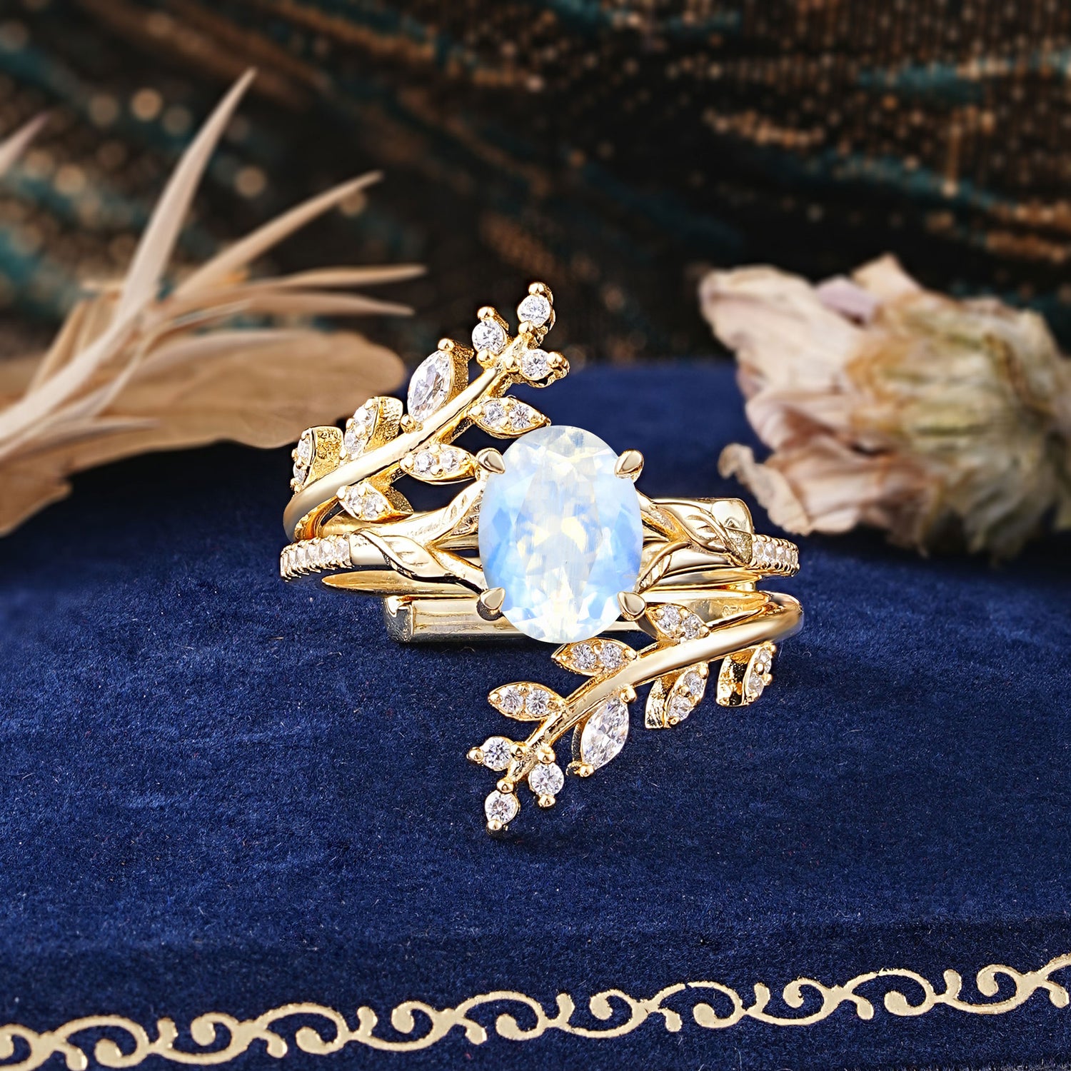 Delicate Leaf Embellished 4 - Prong Oval - Cut Moonstone Bridal Ring Set