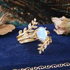 Delicate Leaf Embellished 4 - Prong Oval - Cut Moonstone Ring Sets