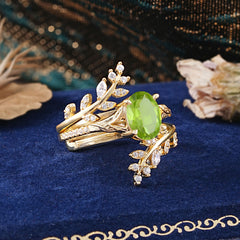 Delicate Leaf Embellished 4 - Prong Oval - Cut Peridot Ring Sets