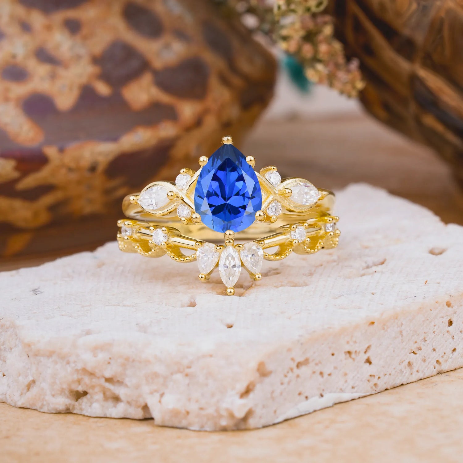 6 Prong Romantic Vine Themed Pear Cut Sapphire Bridal Ring Set
