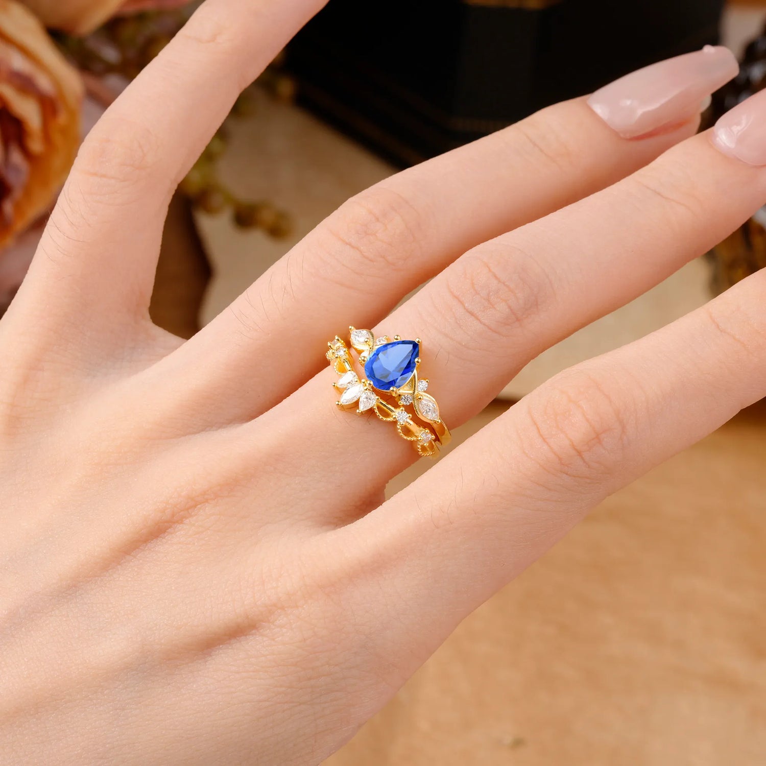 6 Prong Romantic Vine Themed Pear Cut Sapphire Bridal Ring Set