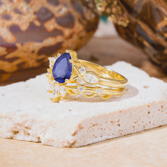 6 Prong Romantic Vine Themed Pear Cut Tanzanite Rings