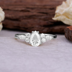 Sophisticated 4-Prong Pear-Cut Moissanite Promise Ring