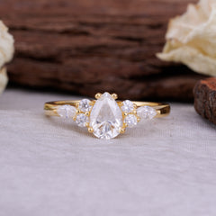 Sophisticated 4-Prong Pear-Cut Moissanite Promise Ring
