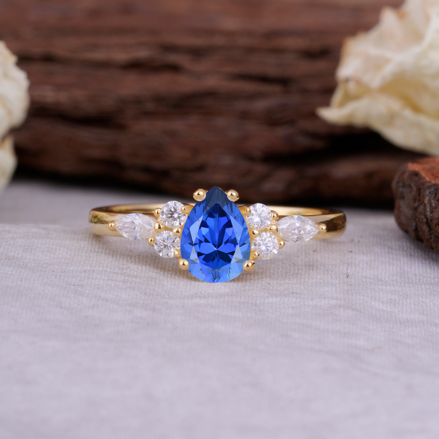 Sophisticated 4-Prong Pear-Cut Sapphire Engagement Ring
