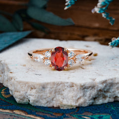 Sophisticated 4-Prong Oval Cut Garnet Engagement Ring