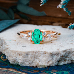 Sophisticated 4-Prong Oval Cut Emerald Engagement Ring
