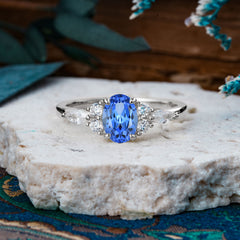 Sophisticated 4-Prong Oval Cut Sapphire Engagement Ring