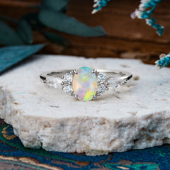 Sophisticated 4-Prong Oval Cut Opal Engagement Ring