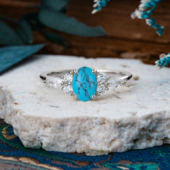 Sophisticated 4-Prong Oval Cut Turquoise Engagement Ring