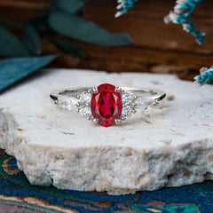 Sophisticated 4-Prong Oval Cut Ruby Engagement Ring