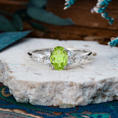 Sophisticated 4-Prong Oval Cut Peridot Engagement Ring
