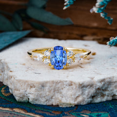 Sophisticated 4-Prong Oval Cut Sapphire Engagement Ring
