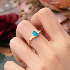 Sophisticated 4-Prong Oval Cut Turquoise Engagement Ring