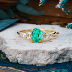 Sophisticated 4-Prong Oval Cut Emerald Engagement Ring