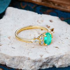 Sophisticated 4-Prong Oval Cut Emerald Engagement Ring