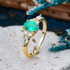 Sophisticated 4-Prong Oval Cut Emerald Engagement Ring