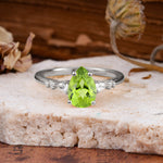 Pear Cut Peridot Three-Stone Engagement Ring for her - Additional view