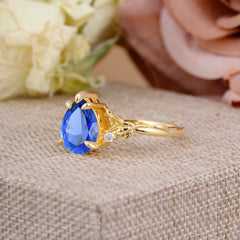 Elegant & Luxurious 5 prong Pear-Cut Sapphire Wedding Band