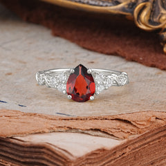 Nature-Inspired Vintage 4-Prong Pear Cut Garnet Ring