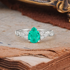 Nature-Inspired Vintage 4-Prong Pear Cut Emerald Ring