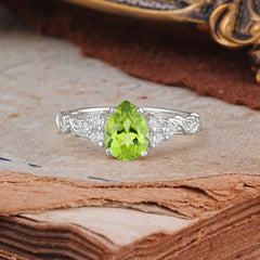 Nature-Inspired Vintage 4-Prong Pear Cut Peridot Ring