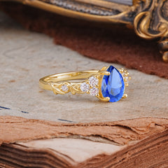 Nature-Inspired Vintage 4-Prong Pear Cut Sapphire Bridal Set